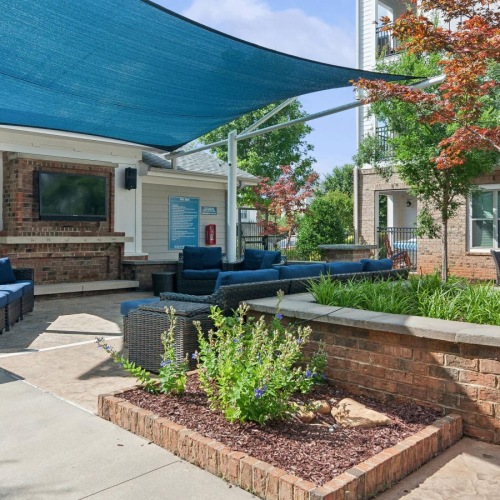 Settle into comfort at Axis Berewick a house with a brick patio