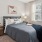 a well-furnished bedroom of a Charlotte apartment at Axis Berewick