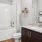 a bathroom with a tub sink and toilet